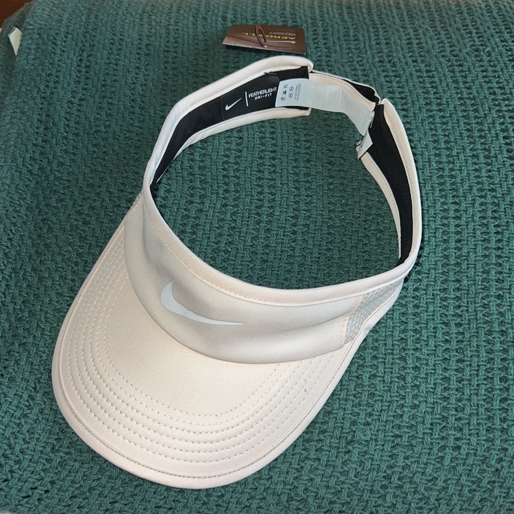 Brand new Nike visor! Baby pink, one size
